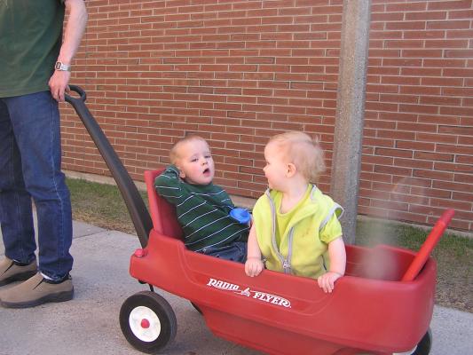 Noah and Sarah are in the wagon. Noah has a cough.