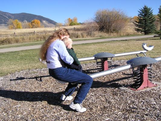 Katie and Noah on a teter totter.