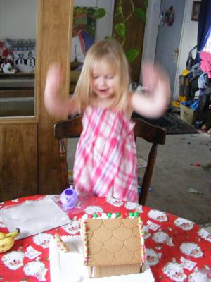 Sarah making a gingerbread house