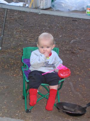 Noah sitting in his camp chair