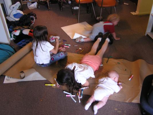 Andrea, Malia, Sarah and Noah color on big paper