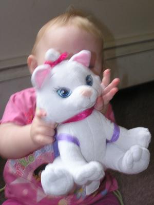 Sarah plays with her new kitty.