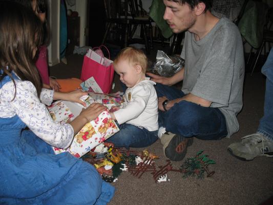 Andrea helps open some presents.
(We couldn't get Sarah interested.)