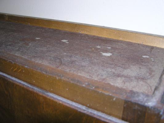 Thick greasy dirt accumulated over many years.