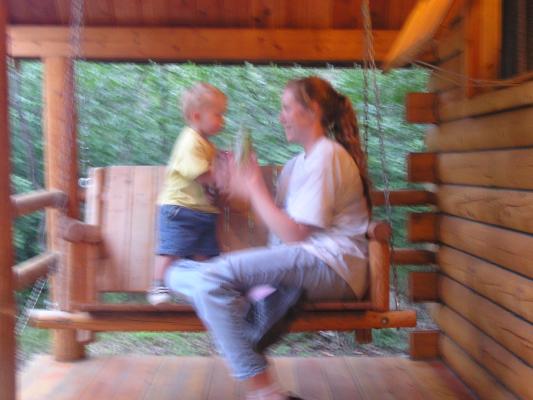 Noah and Sarah on the porch swing.