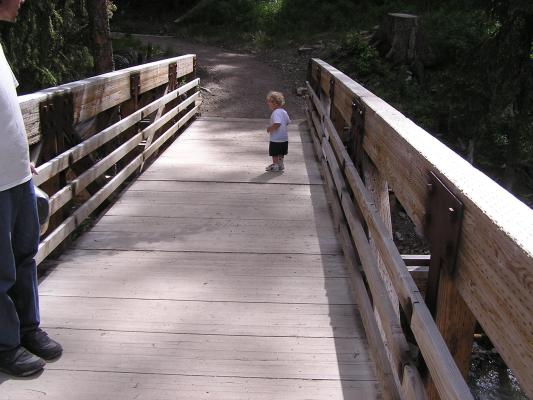 Noah gets ready to cross the bridge.