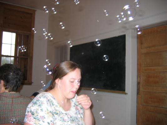 Jennifer blows some bubbles