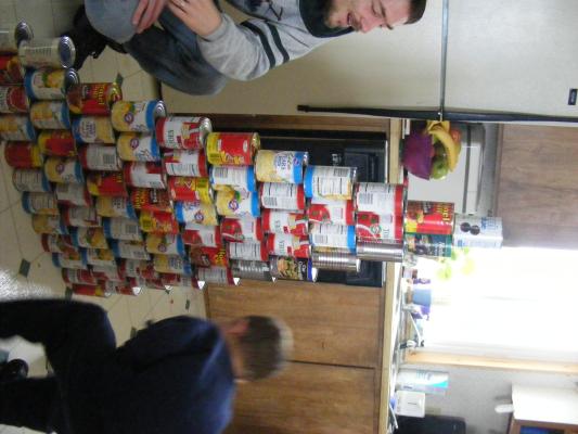 David helps the kids build a pyramid