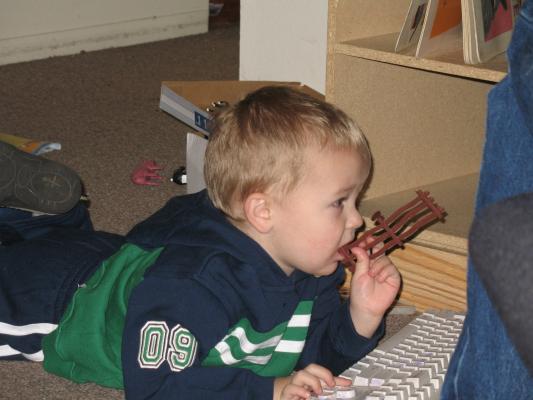 Noah plays on his computer.