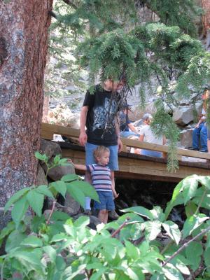 DAvid and Noah playing by the bridge