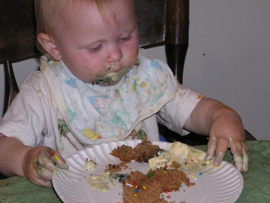 Sarah eats some birthday cake with sprinkles.