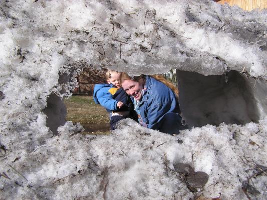 Look, Noah our snow fort melted a window.