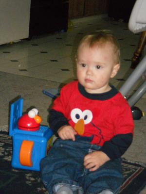 Joshua with Elmo stuff. 