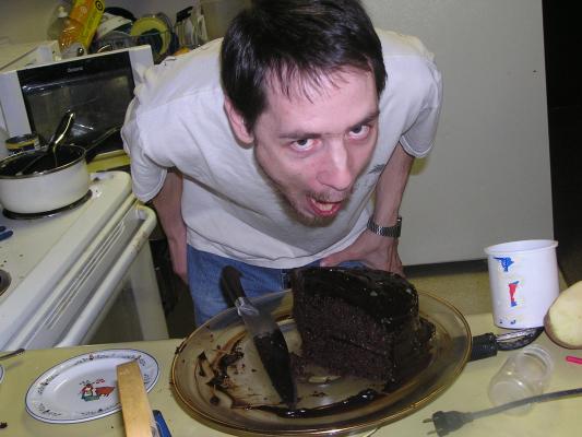 David eats birthday cake.