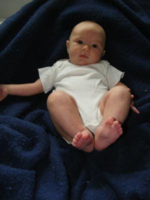 Joshua in a blue blanket.