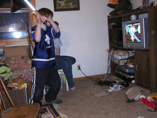 Darth Patrick swings his light saber.