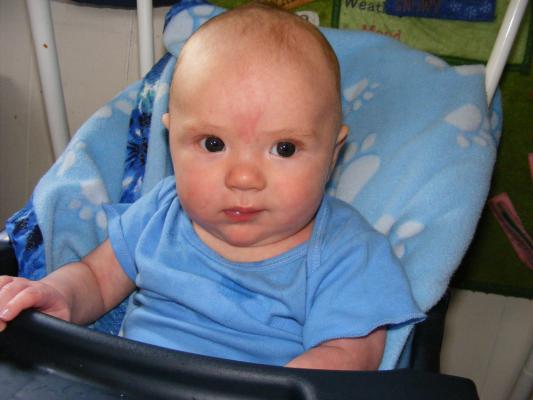 Joshua in his swing.