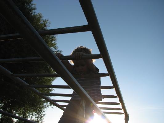 Noah is on the monkey bars