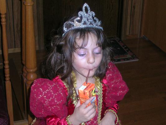 Andrea dresses up as a princess.