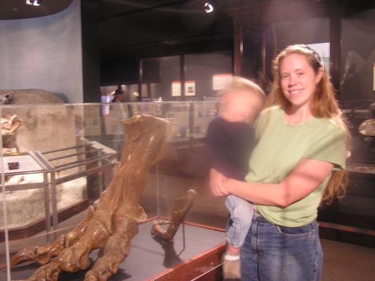 Katie and Noah look at a T-Rex foot at the Museum of the Rockies.