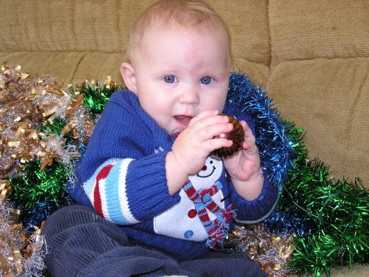Sarah holds a X-mas ball