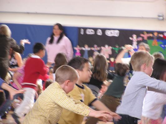 Andrea's class performed a Australian song. You can see the blury back of her head.