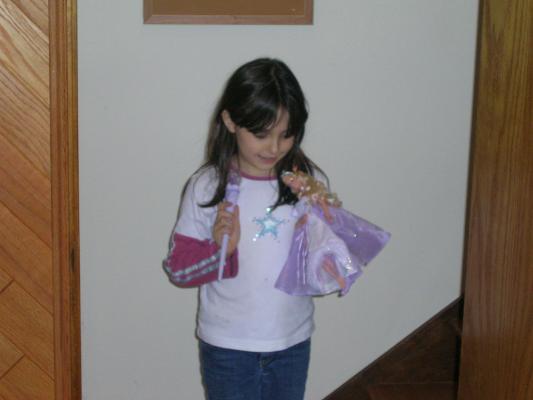 Malia plays with her doll