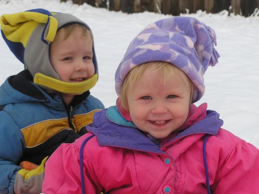 Noah and Sarah ride the sled