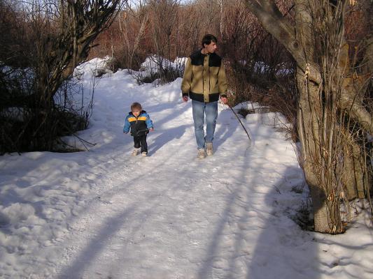 Noah and David both take their sticks for a hike.