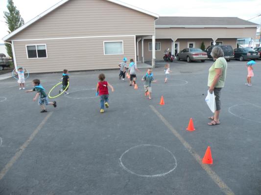 Blue Sprouts play some games outside.