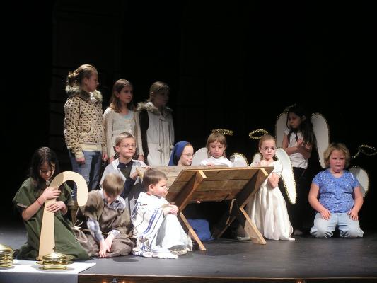 The readers: Breanna, Jenna and Amie, join the actors on stage.