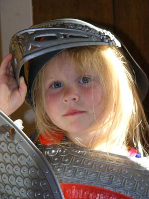 Sarah peeks out from under her helmet of Salvation.