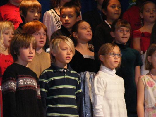 Andrea in school program.
