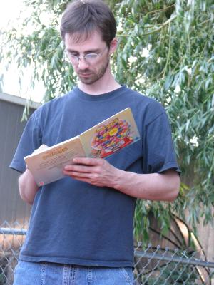 Jim reading a book that is right at his leavel