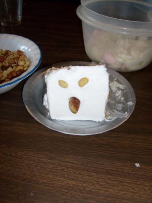 A face on leftover wedding cake