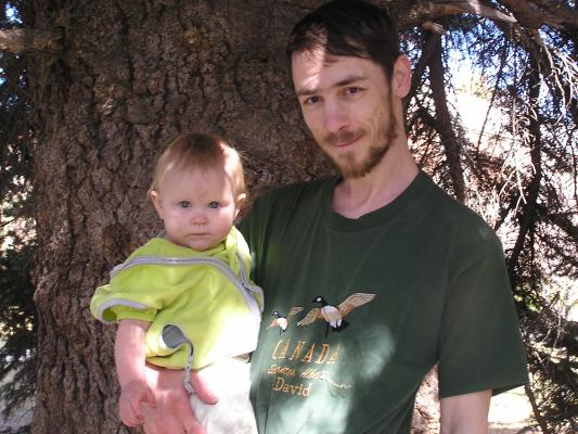 Sarah and David under a tree at the MSU duck pond.