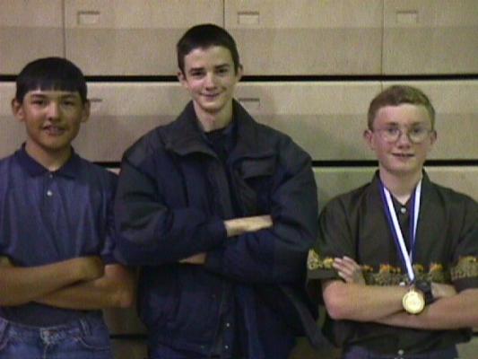 Matthew (center) with his friends, Dewey and ?