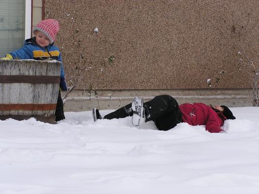 Andrea makes a snow angel.