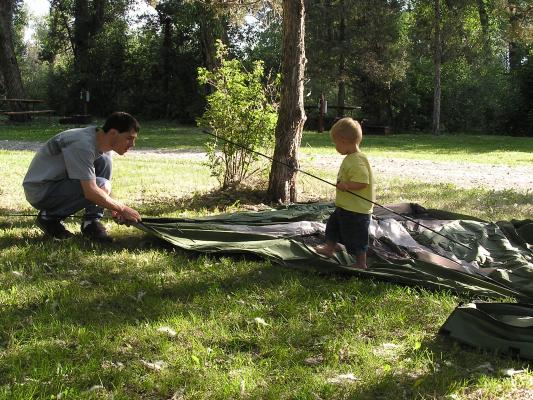 David and Noah put up the tent.