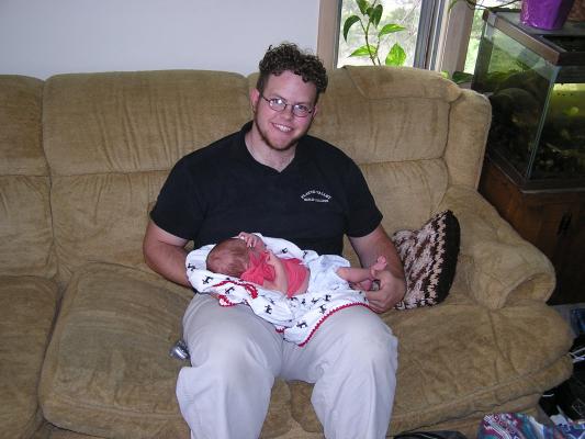 Uncle Titus shows off his new nephew