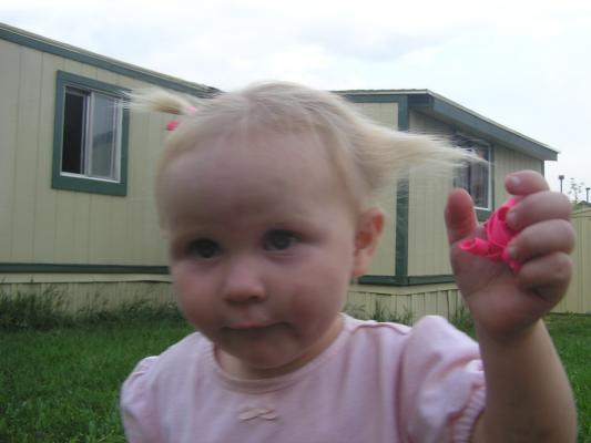 Sarah pulls out one of her pigtails