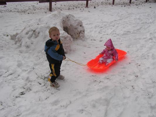 Sarah makes the sled very heavy