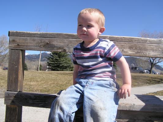 Noah sits on the bench.