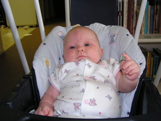Sarah in her swing.