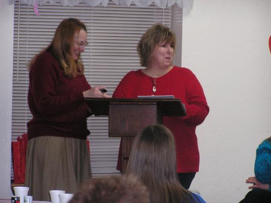 Kathy Fisher and Kim Miller hosted the Valentines Married Game.