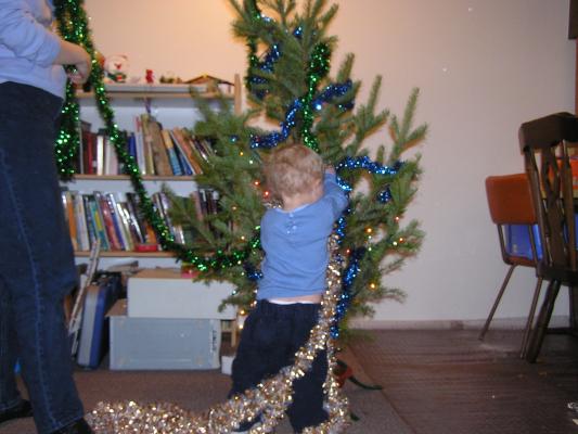 Noah puts on the garland.