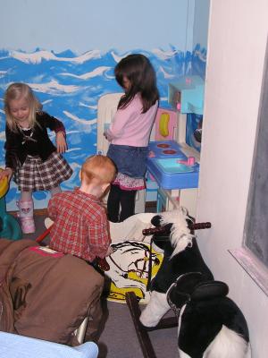 Kiley, Steven and Andra play at the church after the funeral.