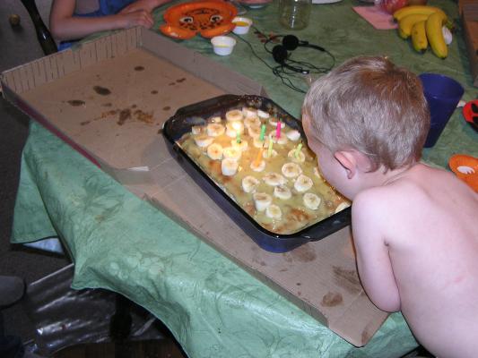 Noah re-blows out the candles.