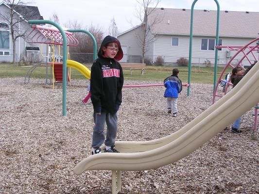 Kids play at the park before the Easter egg hunt.