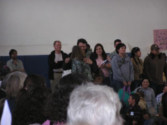Miss Jones (Malia's teacher) receives 
and her class receive a prize for gathering the most 